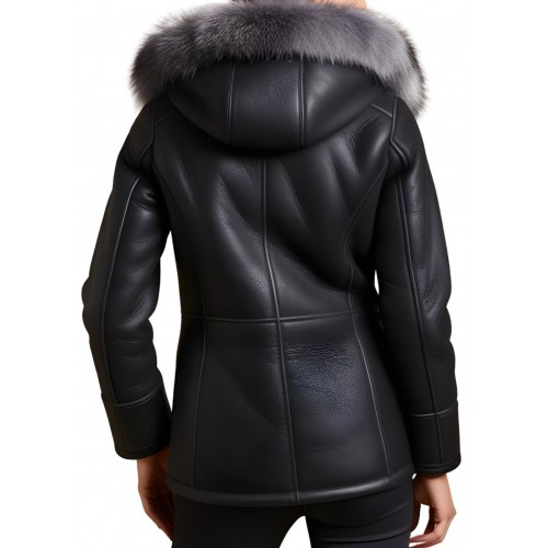 Veste en peau lainée mouton mérinos extèrieur aspect cuir huilé noir col renard argenté amovible modèle Mulina