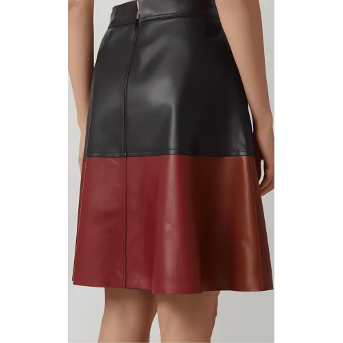 Jupe mi longue en cuir d'agneau bicolore noir et marron modèle Ninia Jupe mi longue en cuir d'agneau bicolore noir et marron modèle Ninia